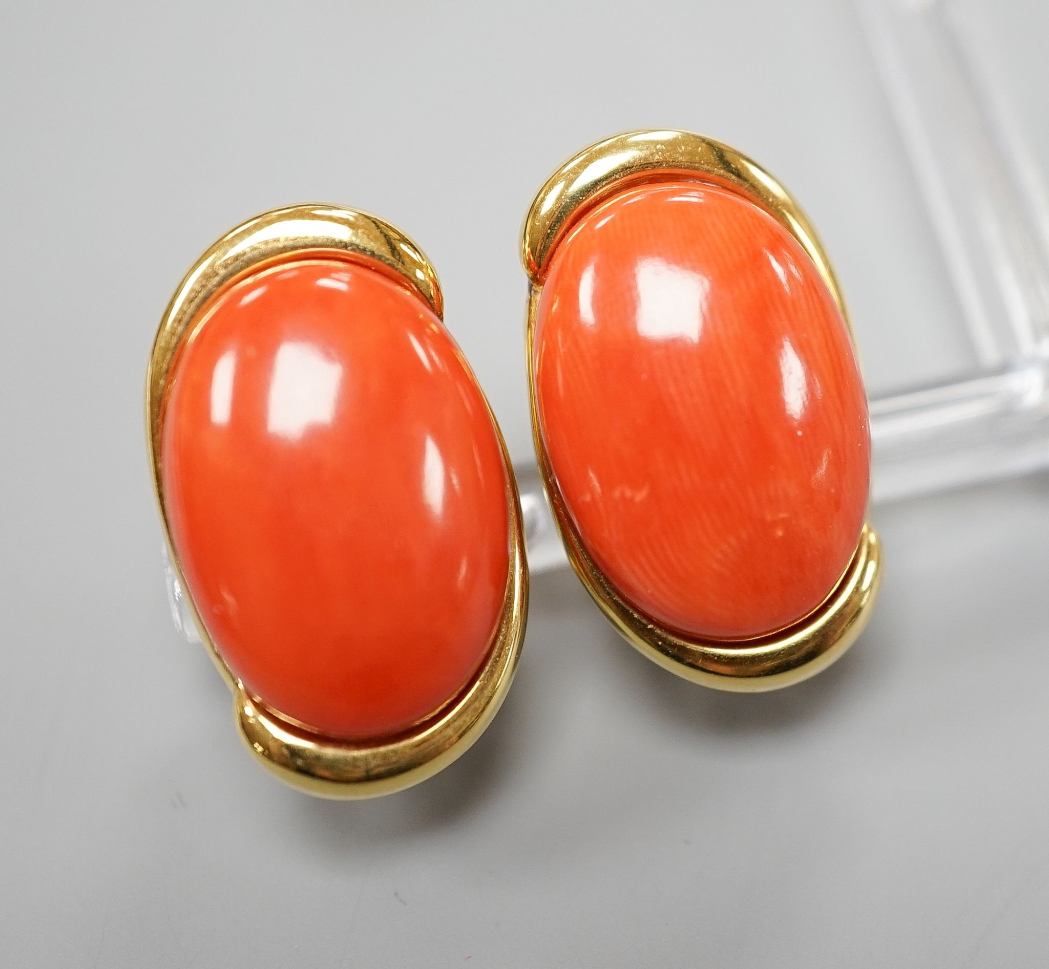 A pair of modern Italian 750 yellow metal and oval coral bead set earrings, 22mm, gross weight 17.2 grams.